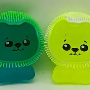 The hairy bear pinches the toy